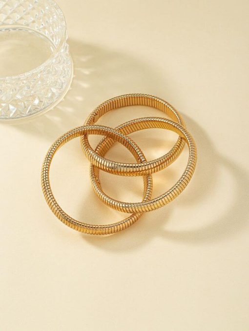 Golden Cobra Triple-Stack Bangle - Image 4
